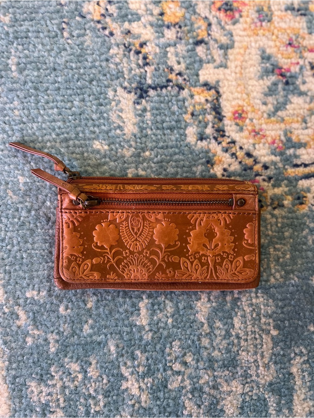 The Sak Encino Card Wallet in tobacco floral embossed leather